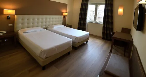 Best Western Grand Hotel Guinigi Rooms Photos