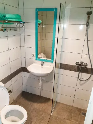 Aruuman Hotel Simpang Lima Kamar Photos