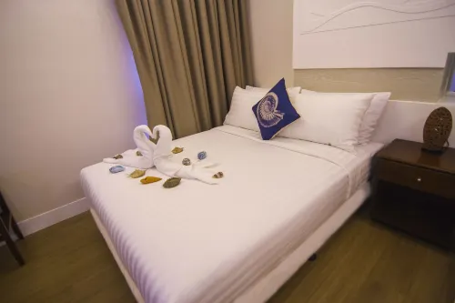 The Reef Hotel and Residences Huoneet Photos