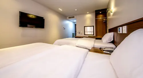 Sunrise Hotel Jungmun Branch Chambres Photos
