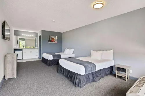 Hotel 10 Extended Stay Rooms Photos