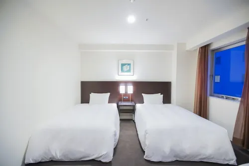 Hotel Sunroute Tokushima Zimmer Photos