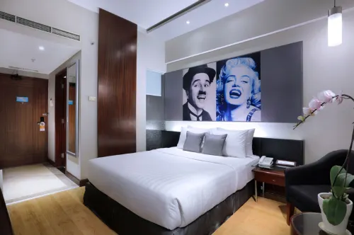 Grand Candi Hotel Rooms Photos
