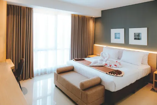 Azana Style Hotel Madura Kamar Photos