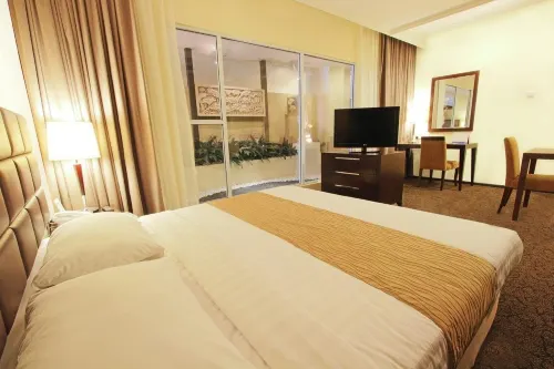 Harmoni One Convention Hotel and Service Apartments Kamar Photos