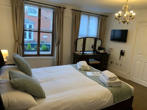 Pilgrims Hotel Huoneet Photos
