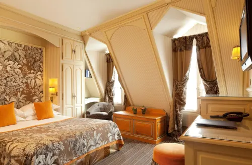 Au Manoir Saint-Germain des Prés. Chambres Photos