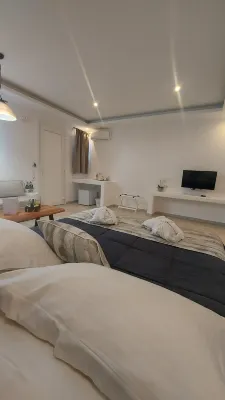 Ambience Suites Rooms Photos