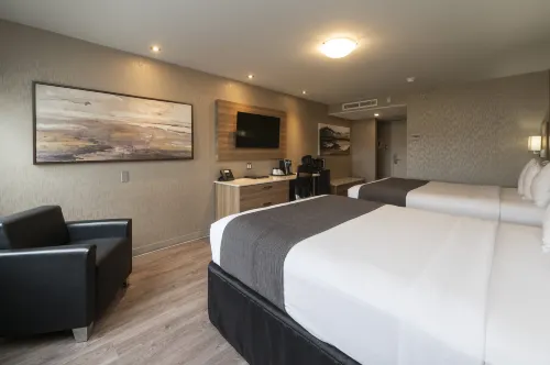 Hôtel & Suites le Dauphin Québec Chambres Photos