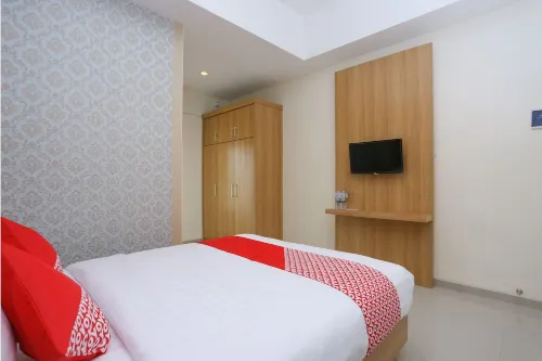 OYO 999 Garuda Guesthouse Chambres Photos