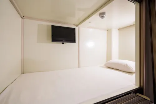 Capsule Hotel Cube Hiroshima Chambres Photos