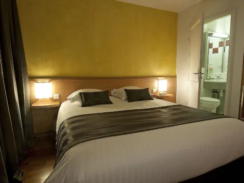 Hôtel le Grillon Chambres Photos