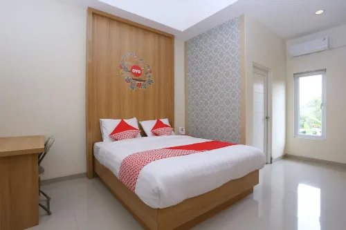 OYO 999 Garuda Guesthouse Chambres Photos