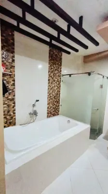 OYO 871 Herel Guest House Chambres Photos