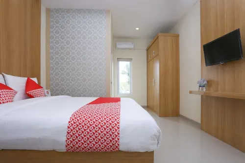 OYO 999 Garuda Guesthouse Chambres Photos