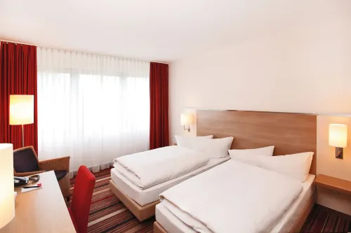 H+ Hotel Bochum Kamar Photos
