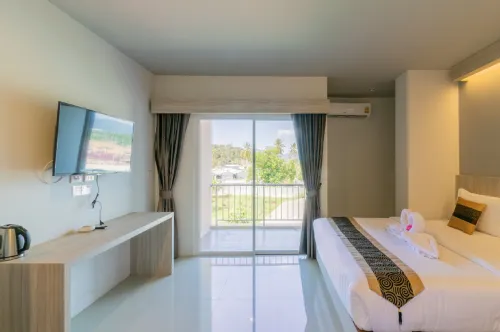 Carpio Hotel Phuket Kamar Photos