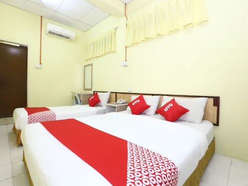 Super OYO 89651 Harmoni Hotel Zimmer Photos