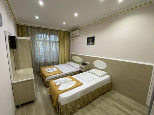 Grand Oral Hotel Rooms Photos
