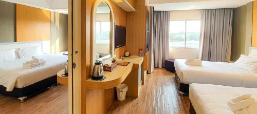 New Travel Lodge Hotel Huoneet Photos