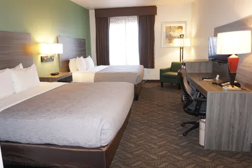 Quality Inn & Suites Airport West Rooms Photos