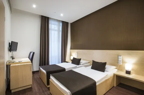 Promenade City Hotel Photos