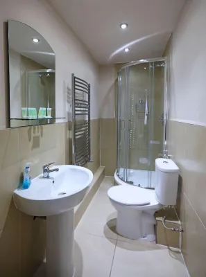 Palmerston Suites Chambres Photos