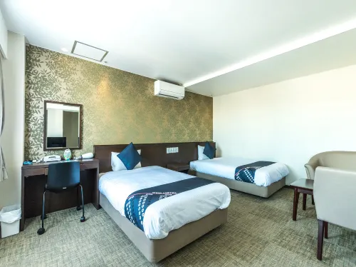 OYO City Hotel Higashimatsuyama Zimmer Photos
