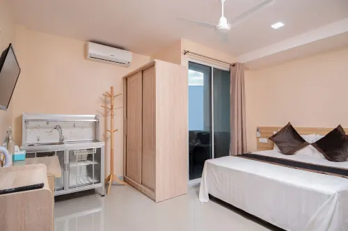 Triton Beach Hotel & Spa Chambres Photos