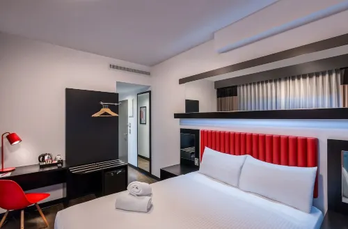 Essence Hotel Carlton Zimmer Photos