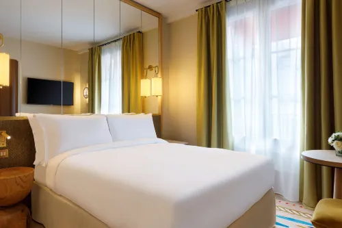 Le Belgrand Hotel Paris Champs Elysees, Tapestry Collection by Hilton Chambres Photos