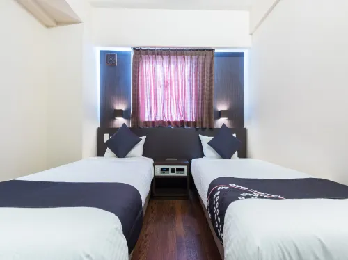 OYO City Hotel Higashimatsuyama Zimmer Photos