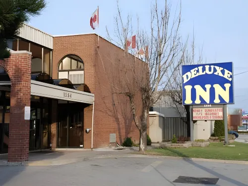 Deluxe Inn Extérieur Photos