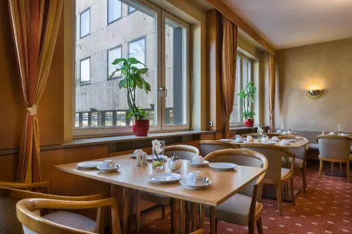 PLAZA INN Rieker Stuttgart Hauptbahnhof Mahlzeiten Photos