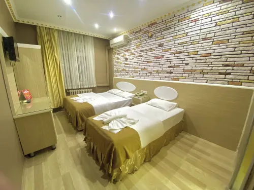 Grand Oral Hotel Rooms Photos