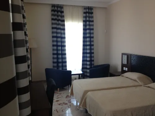Grand Harbour Hotel Rooms Photos