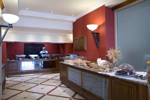 Ramada by Wyndham, Athens Club Attica Riviera Restauration Photos
