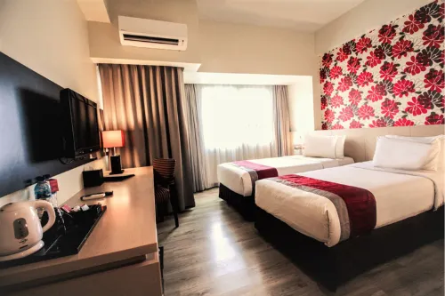 Solo Paragon Hotel & Residence Kamar Photos