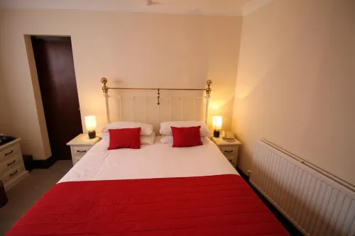 Pilgrims Hotel Rooms Photos