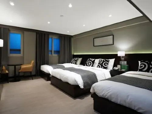 Quest Hotel Kuta Bali  by Aston Photos