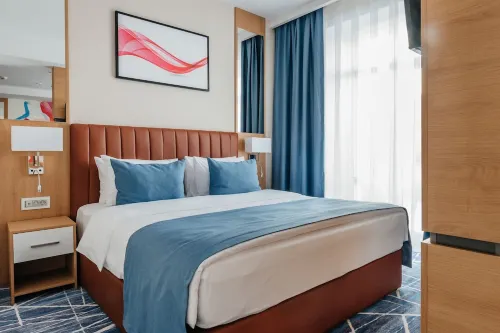 Ramada by Wyndham Astana Zimmer Photos