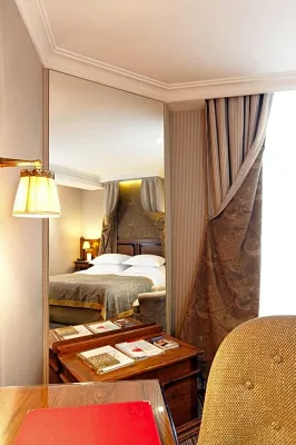 Au Manoir Saint-Germain des Prés. Chambres Photos