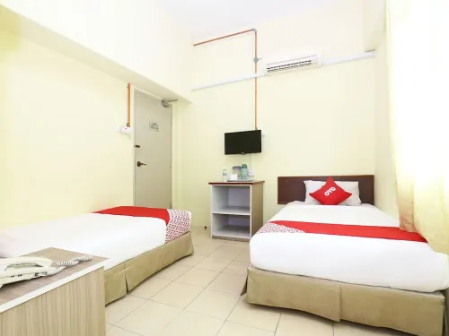 Super OYO 89651 Harmoni Hotel Zimmer Photos