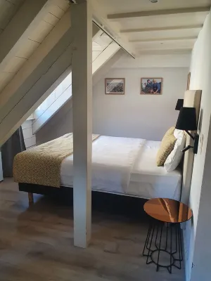 L'Hotel by Hostellerie du Chateau Zimmer Photos