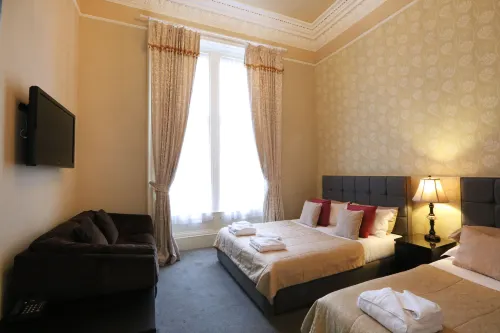 Palmerston Suites Chambres Photos