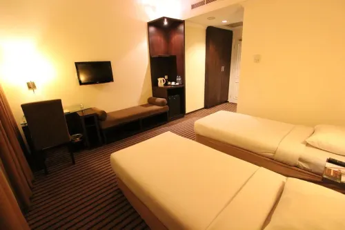 Harmoni One Convention Hotel and Service Apartments Kamar Photos