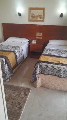 St.Joseph Hotel Rooms Photos