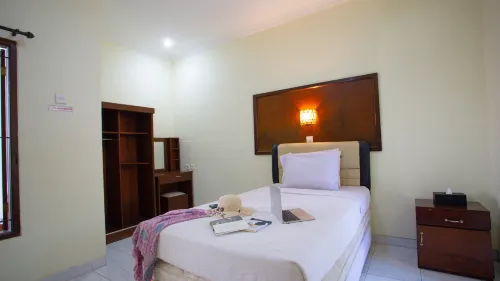 Teges Inn Kuta Rooms Photos