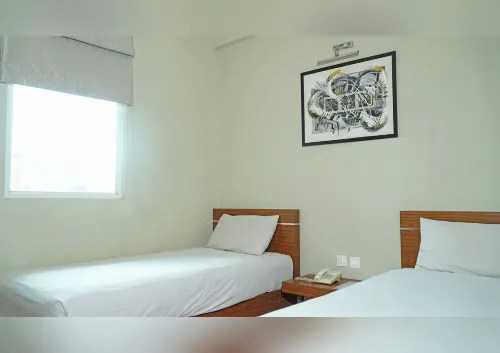 World Hotel Jakarta - Bandengan Zimmer Photos
