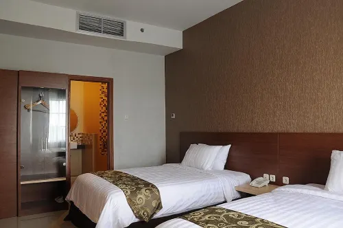 Quest Hotel Kuta Bali  by Aston Photos